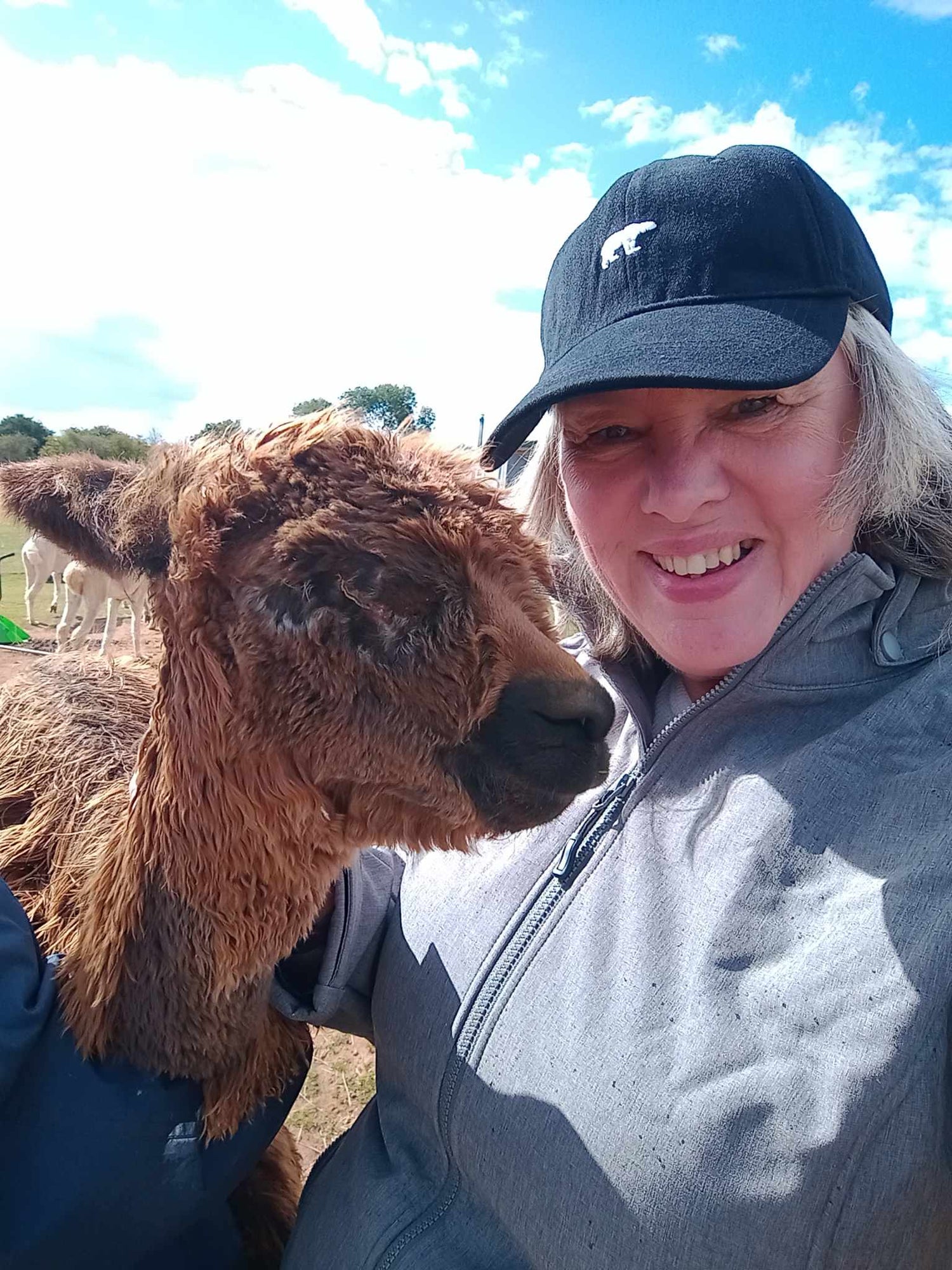 Mango fully recovered & customer  taking a selfie on a sunny day.